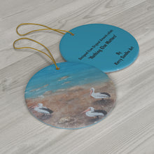 Load image into Gallery viewer, Original artwork front, description on back. Thick high-quality porcelain. 7cm diameter. Comes w/ ribbon by Kerry Sandhu Art