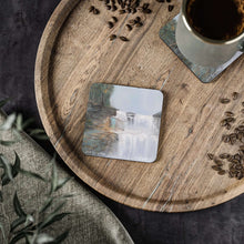 Load image into Gallery viewer, Corkwood underside, glossy finish on top. 1 or 4 pc sets. 9.5 x 9.5cm. Mystical waterfall with a hidden door to another world