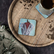Load image into Gallery viewer, Corkwood underside, glossy finish on top. 1 or 4 pc sets. 9.5 x 9.5cm. Asian elephant in headdress w/ a blackbird on its head