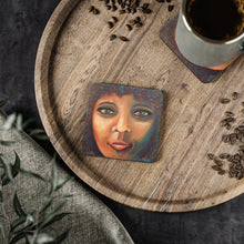 Load image into Gallery viewer, Corkwood underside, glossy finish on top. 1 or 4 pc sets. 9.5 x 9.5cm. Close up portrait of an African American woman