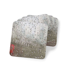 Load image into Gallery viewer, Corkwood underside, glossy finish on top. 1 or 4 pc sets. 9.5x9.5cm. Raindrops on window with a misty London skyline outside
