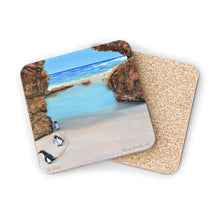 Load image into Gallery viewer, Corkwood underside, glossy finish on top. 1 or 4 pc sets. 9.5x9.5cm Penguins marching from a turquoise ocean up a rocky beach