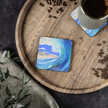 Load image into Gallery viewer, Corkwood underside, glossy finish on top. 1 or 4 pc sets. 9.5 x 9.5cm. Wave crashing at a beach