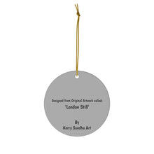 Load image into Gallery viewer, Original artwork front, description on back. Thick high-quality porcelain. 7cm diameter. Comes w/ ribbon by Kerry Sandhu Art