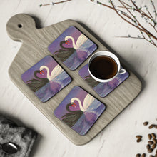 Load image into Gallery viewer, Corkwood underside, glossy finish on top. 1 or 4 pc sets. 9.5x9.5cm. Black & white swans touching heads creating a love heart
