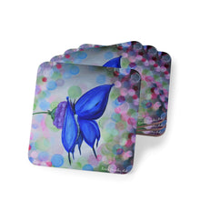 Load image into Gallery viewer, Corkwood underside, glossy finish on top. Comes in 1 or 4 pc sets 9.5 x 9.5cm. Blue butterfly on flower & abstract background