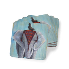 Load image into Gallery viewer, Corkwood underside, glossy finish on top. 1 or 4 pc sets. 9.5 x 9.5cm. Asian elephant in headdress w/ a blackbird on its head