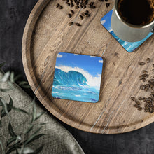 Load image into Gallery viewer, Corkwood underside, glossy finish on top. 1 or 4 pc sets. 9.5 x 9.5cm. Crashing wave over a reef. Surf wave, blue water