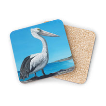 Load image into Gallery viewer, Corkwood underside, glossy finish on top. 1 or 4 pc sets. 9.5 x 9.5cm. Australian pelican overlooking a beach from a cliff