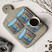 Load image into Gallery viewer, Corkwood underside, glossy finish on top. 1 or 4 pc sets. 9.5x9.5cm. Silhouette of a woman under a chakra-coloured waterfall