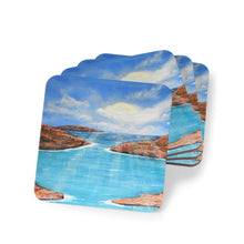 Load image into Gallery viewer, Corkwood underside, glossy finish on top. 1 or 4 pc sets. 9.5x9.5cm. Outback Australia Islands, clouds, sunrays, blue water