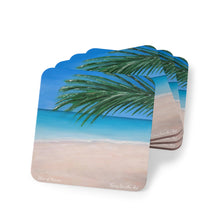 Load image into Gallery viewer, Corkwood underside, glossy finish on top. 1 or 4 pc sets. 9.5 x 9.5cm. Palm leaves and a tranquil turquoise beach