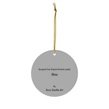 Load image into Gallery viewer, Original artwork front, description on back. Thick high-quality porcelain. 7cm diameter. Comes w/ ribbon by Kerry Sandhu Art