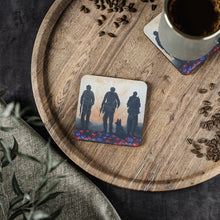 Load image into Gallery viewer, Corkwood underside, glossy finish on top. 1 or 4 pc sets. 9.5 x 9.5cm. ANZAC Soldiers & dog in a poppy field w/ an F-18 jet