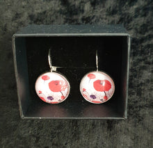 Load image into Gallery viewer, Original painting of red poppies with an abstract background on 18mm silver coloured clasp earrings
