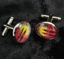 Load image into Gallery viewer, 16mm Cufflinks - Abstract Aboriginal flag/Rising Sun & silhouette of Aboriginal holding spear & soldier holding gun & poppies