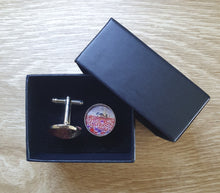 Load image into Gallery viewer, 16mm Cufflinks - Sunrise (ANZAC Crest), silhouette of soldier with horse drinking from hat, & field of red & purple poppies