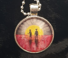 Load image into Gallery viewer, 25mm Pendant/Chain -Abstract Aboriginal flag/Rising Sun silhouette of Aboriginal holding spear, soldier holding gun & poppies