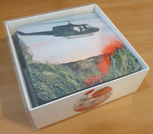 Load image into Gallery viewer, Cork underside, glossy finish top. 1 or 4 pc sets. 9.5x9.5cm. Box set 6 different ANZAC original artworks with BONUS magnets