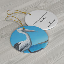 Load image into Gallery viewer, Original artwork front, description on back. Thick high-quality porcelain. 7cm diameter. Comes w/ ribbon by Kerry Sandhu Art