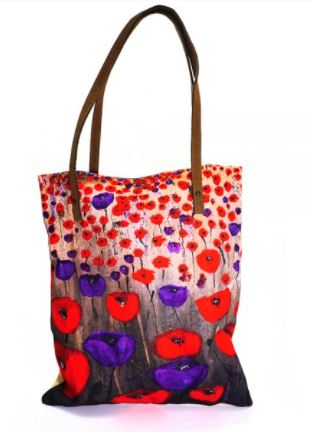 Original artwork of a field of red and purple poppies on a large tote bag with leather straps and internal pockets