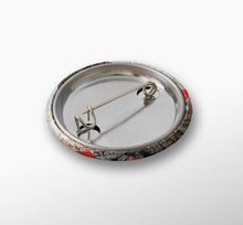 Load image into Gallery viewer, Collectible pins designed from original paintings inspired by the ANZAC Legacy. 7 designs available by Kerry Sandhu Art