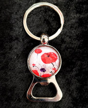 Load image into Gallery viewer, A Bottle opener and keyring in one! Designed from original ANZAC Day art by Kerry Sandhu Art
