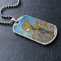 Digger's slouch hat resting on a gun with an ANZAC inspired Crest on a military style dog tag pendant with ball chain