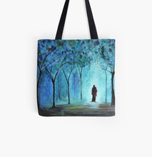 Load image into Gallery viewer, Original painting of a couple hugging in a blue and teal coloured forest on a 41 x 41cm tote bag