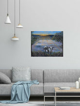 Load image into Gallery viewer, Original painting of a black and white cow eating with the sun rising by Kerry Sandhu Art