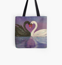Load image into Gallery viewer, Black and a white swan touch heads to form a love heart with the heart reflecting in the water on a 33 x 33cm tote bag