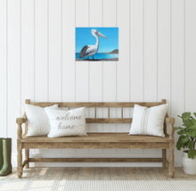 Load image into Gallery viewer, Original painting of an Australian pelican standing rocks overlooking a beach by Kerry Sandhu Art