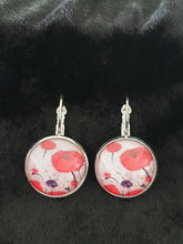 Load image into Gallery viewer, Original painting of red poppies with an abstract background on 18mm silver coloured clasp earrings
