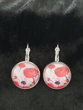 Load image into Gallery viewer, Original painting of red poppies with an abstract background on 18mm silver coloured clasp earrings