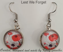 Load image into Gallery viewer, Original painting of red poppies with an abstract background on surgical steel 14mm round fishhook earrings
