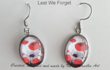Load image into Gallery viewer, Original painting of red poppies with an abstract background on surgical steel 13 x 18mm oval earrings
