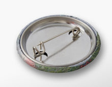 Load image into Gallery viewer, Collectible pins designed from original paintings inspired by the ANZAC Legacy. 7 designs available by Kerry Sandhu Art