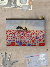 Load image into Gallery viewer, Sunrise, silhouette of soldier with horse drinking from a hat, a field of red & purple poppies - 3 sizes of zipper pouches