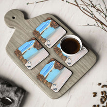 Load image into Gallery viewer, Corkwood underside, glossy finish on top. 1 or 4 pc sets. 9.5x9.5cm Penguins marching from a turquoise ocean up a rocky beach
