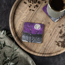 Load image into Gallery viewer, Corkwood underside, glossy finish on top. 1 or 4 pc sets. 9.5 x 9.5cm. Snowscape, tree &amp; a full moon with a purple background
