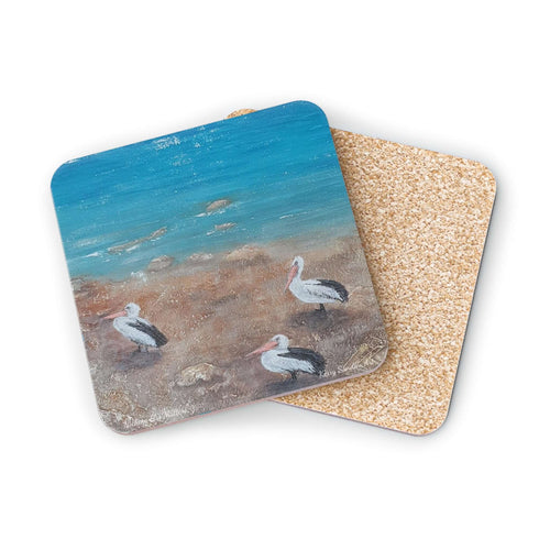 Corkwood underside, glossy finish on top. 1 or 4 pc sets. 9.5 x 9.5cm. Three Australian pelicans on a river bank