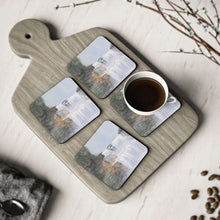 Load image into Gallery viewer, Corkwood underside, glossy finish on top. 1 or 4 pc sets. 9.5 x 9.5cm. Mystical waterfall with a hidden door to another world
