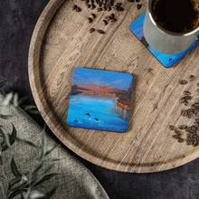 Load image into Gallery viewer, Corkwood underside, glossy finish on top. Comes in 1 or 4 pc sets. 9.5x9.5cm. Mandurah West Australia coastal sunset dolphins
