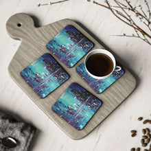 Load image into Gallery viewer, Corkwood underside, glossy finish on top. Available in 1 or 4 pc sets. 9.5 x 9.5cm. Impressionistic city w/ water reflections
