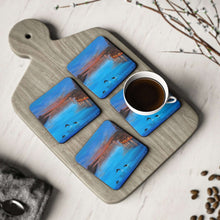 Load image into Gallery viewer, Corkwood underside, glossy finish on top. Comes in 1 or 4 pc sets. 9.5x9.5cm. Mandurah West Australia coastal sunset dolphins
