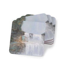 Load image into Gallery viewer, Corkwood underside, glossy finish on top. 1 or 4 pc sets. 9.5 x 9.5cm. Mystical waterfall with a hidden door to another world
