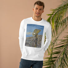 Load image into Gallery viewer, Original painting of a Digger&#39;s slouch hat resting on a gun with an ANZAC inspired Crest on the front of a long sleeve tee and available in black and wite
