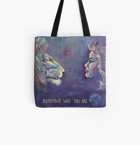 Original bold colour painting of a lion and a lady looking at each other  with the words Remember Who You Are at the bottom on a 33 x 33cm tote bag