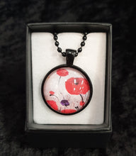 Load image into Gallery viewer, 25mm Black Pendant &amp; Chain - Original painting of red poppies with an abstract background
