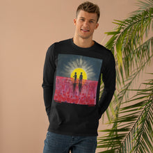 Load image into Gallery viewer, Original painting of a rising sun which is an abstract version of the Aboriginal flag with the silhouette of an Aboriginal holding a spear and a soldier holding a gun surrounded by red poppies on the front of a unisex long sleeve tee available in black and white
